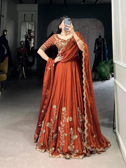LNB Rangoli Silk Orange Surat lehenga choli suppliers